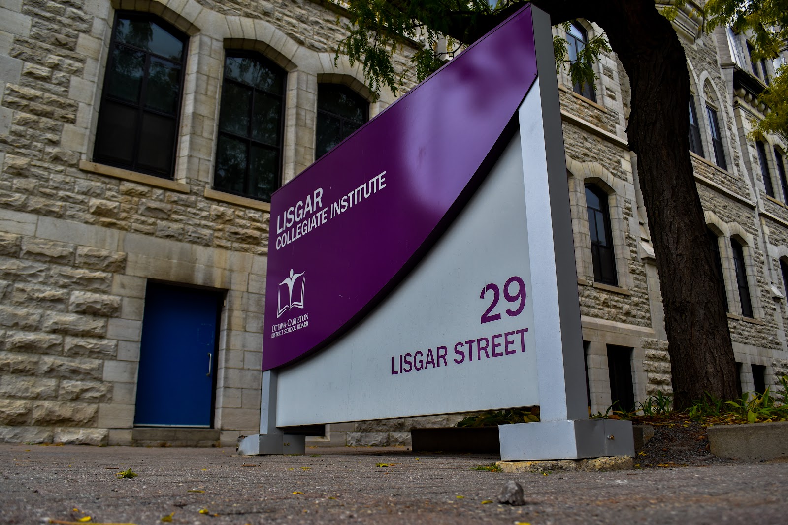 low-angle picture of a sign saying, Lisgar Collegiate Institute